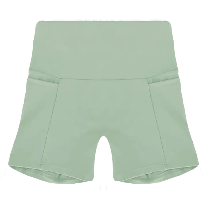 A flat lay image of the Allawah Shorts in the colour Moss, showcasing side pockets and a seamless front